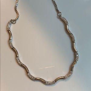 Silver necklace and earring set.